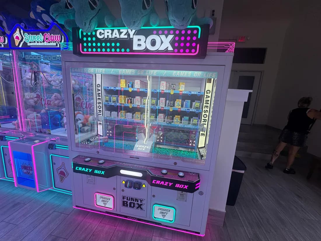 The Crazy Box machine with its lit marquee